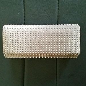 Sparkling champagne-colored night out clutch